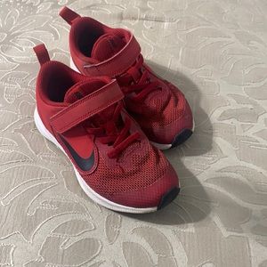 Red Nike running shoes size 11c boys